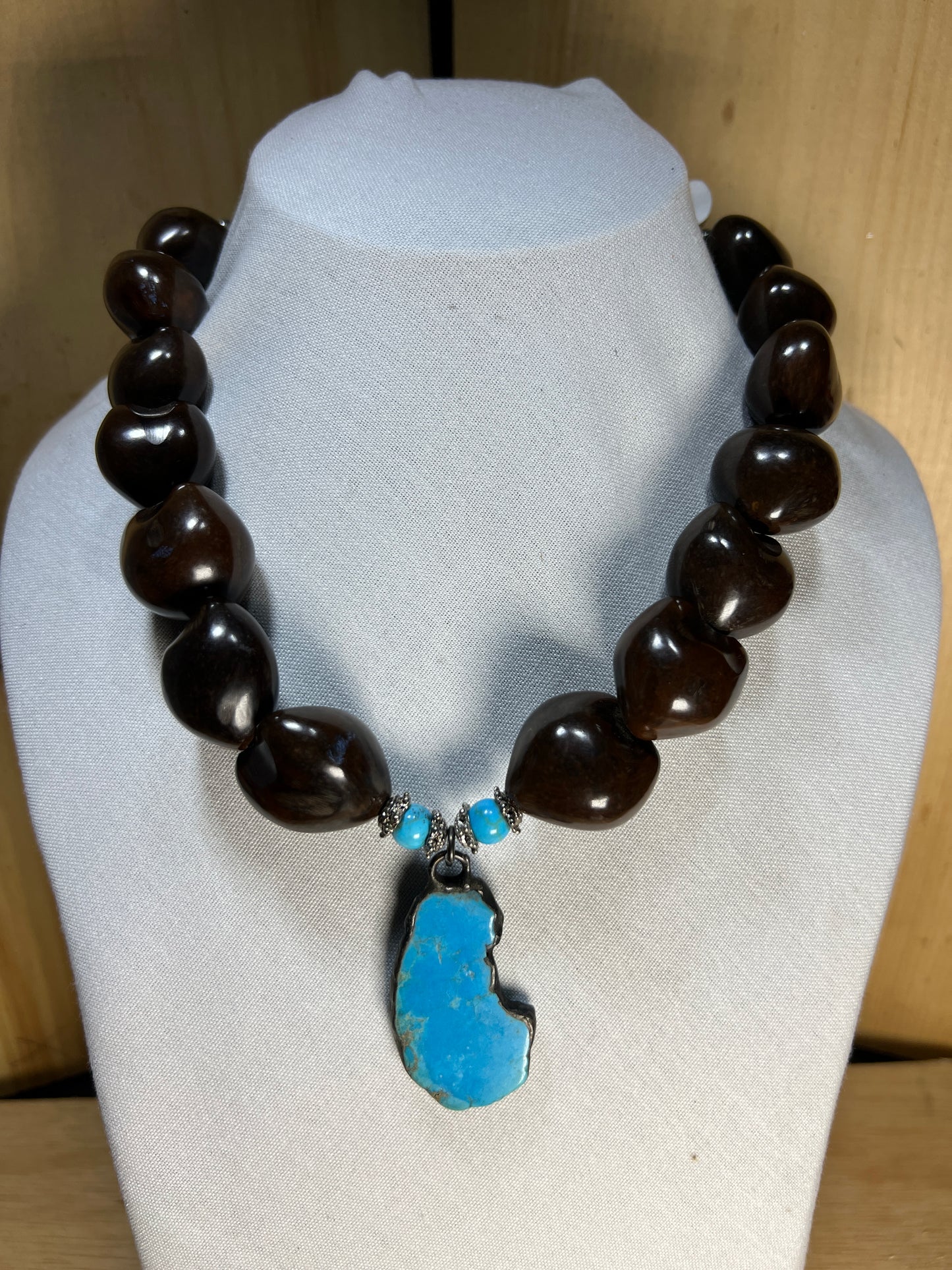 Lightweight Brown Beaded Necklace With Impression Turquoise Accents and Pendant